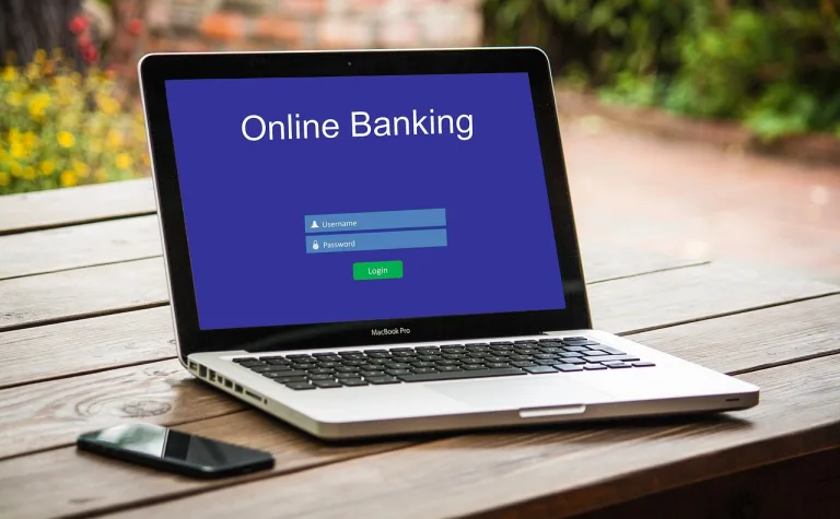 Laptop with Online Banking login page on the screen